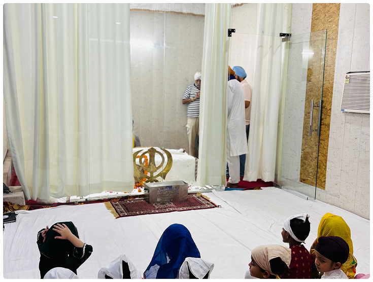 Students and teachers gathered respectfully in prayer hall